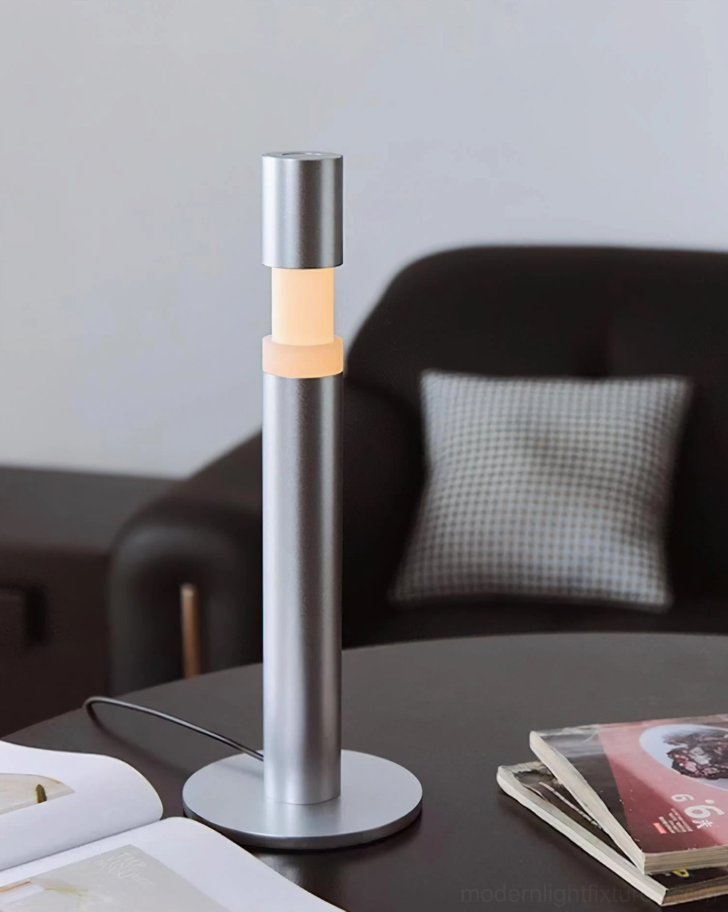 Obelisk table lamp lit dual warm light bands brushed silver finish sofa side table ambiance