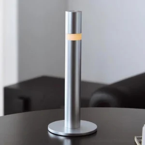 Obelisk modern table lamp with warm LED accent strip on living room side table contemporary interior