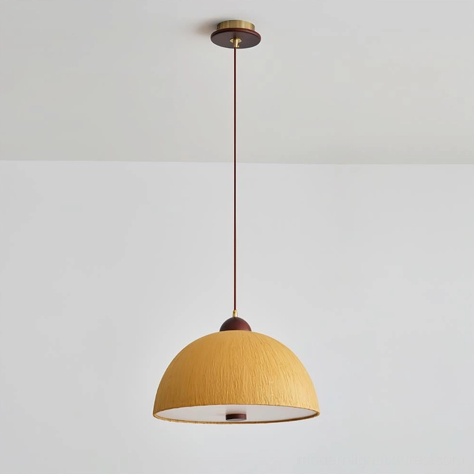 Ochre yellow Doria Model B pendant light in contemporary dining space, 40cm x 25cm tapered shade