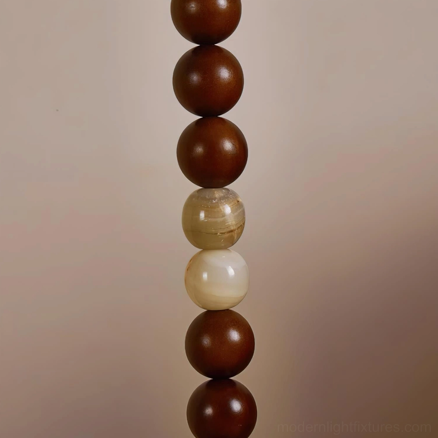 Octavia sculptural floor lamp in modern interior, highlighting wood and marble material composition