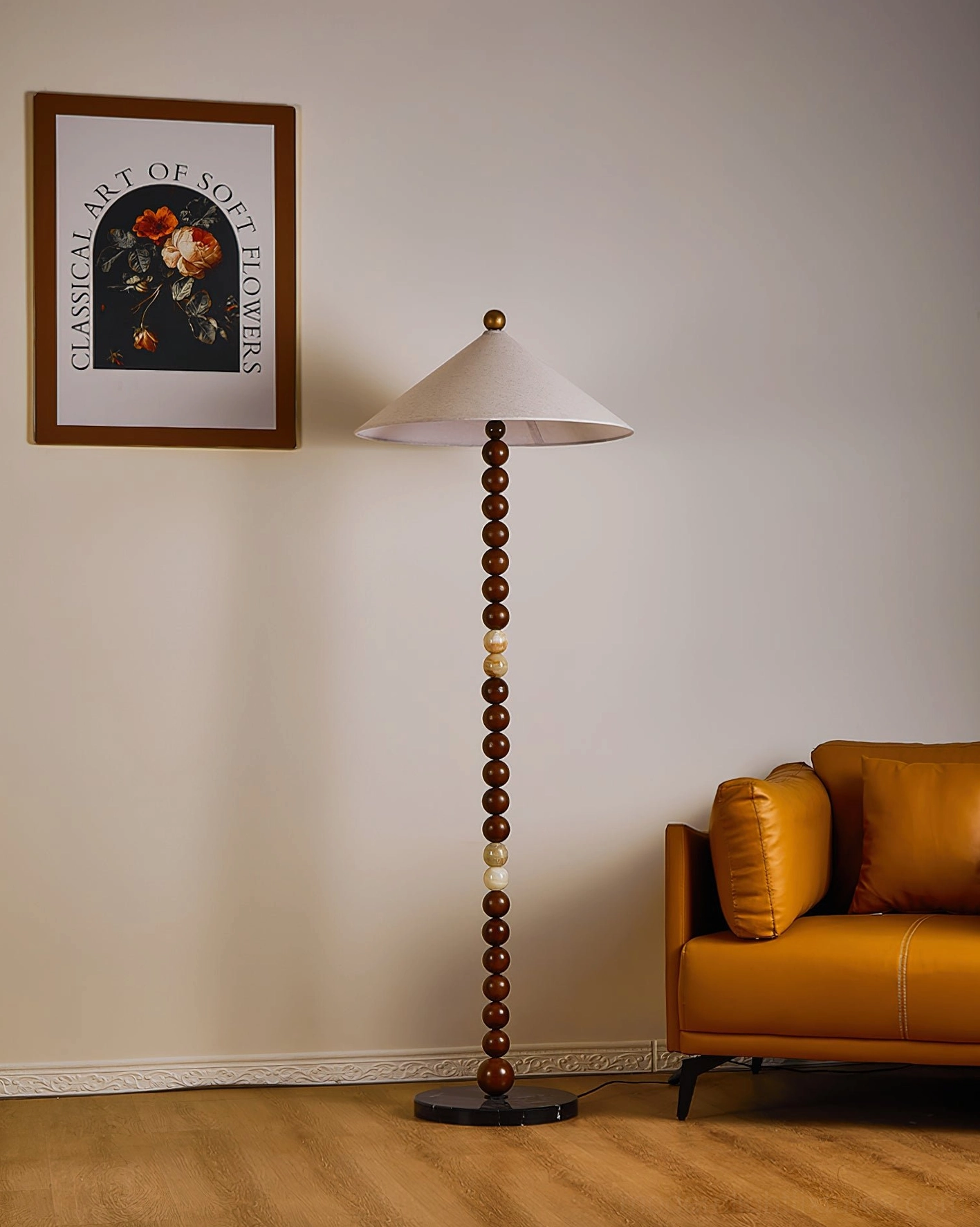 Octavia sculptural floor lamp side view in modern living room interior with wall art