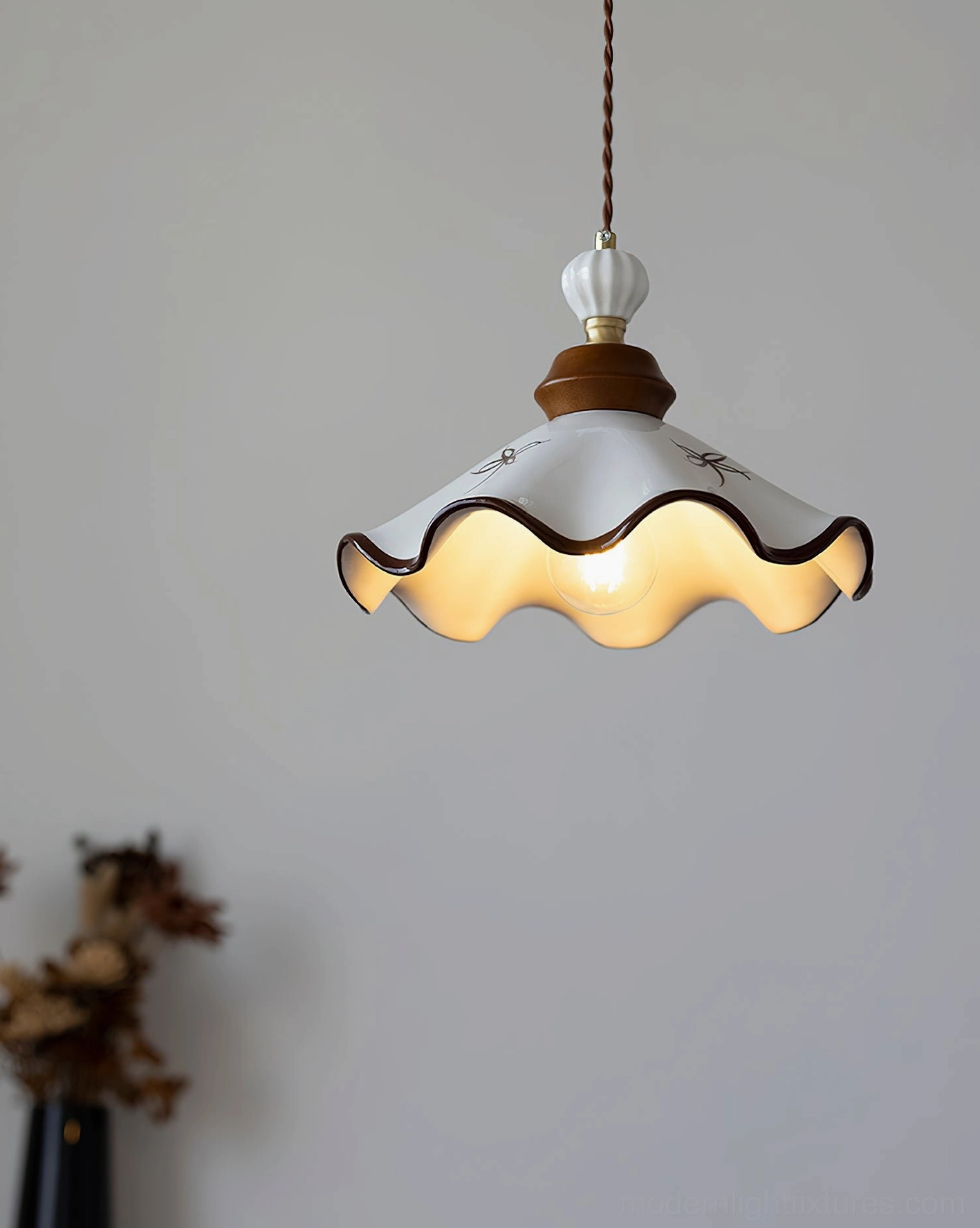 Off-white ceramic pendant light with flared shade design, vintage-inspired pendant fixture for modern homes
