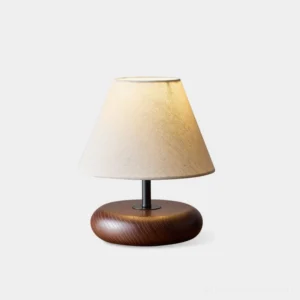 Olen minimalist table lamp with walnut wood base and white linen shade - front view on studio white background