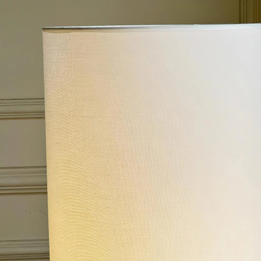 Ollie modern floor lamp detail view showing textured glass base and chrome finish quality