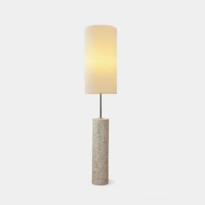 Ollie modern floor lamp with textured glass base and white cylindrical fabric shade - studio front view