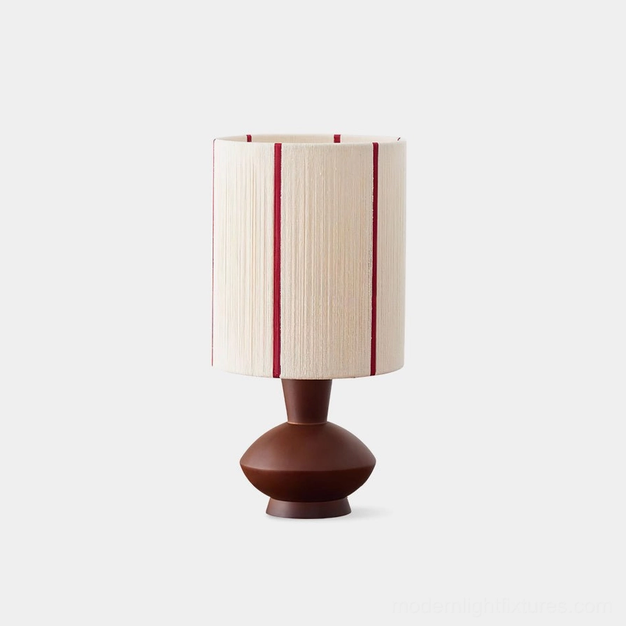 Onslow hand-wrapped hemp rope table lamp with crimson stripes and walnut wood base, front view on white background