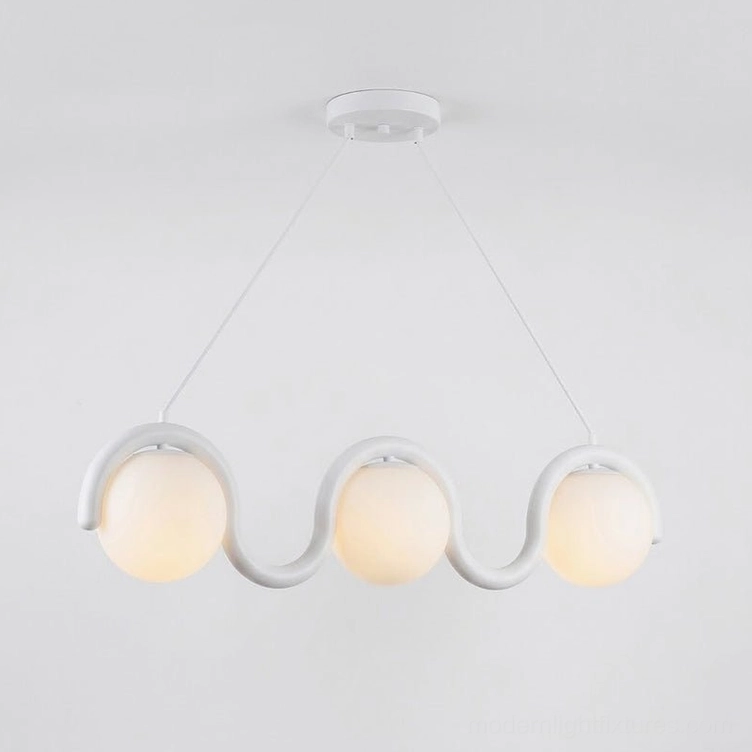 Modern wave pendant fixture featuring opal frosted glass shades and metal frame design
