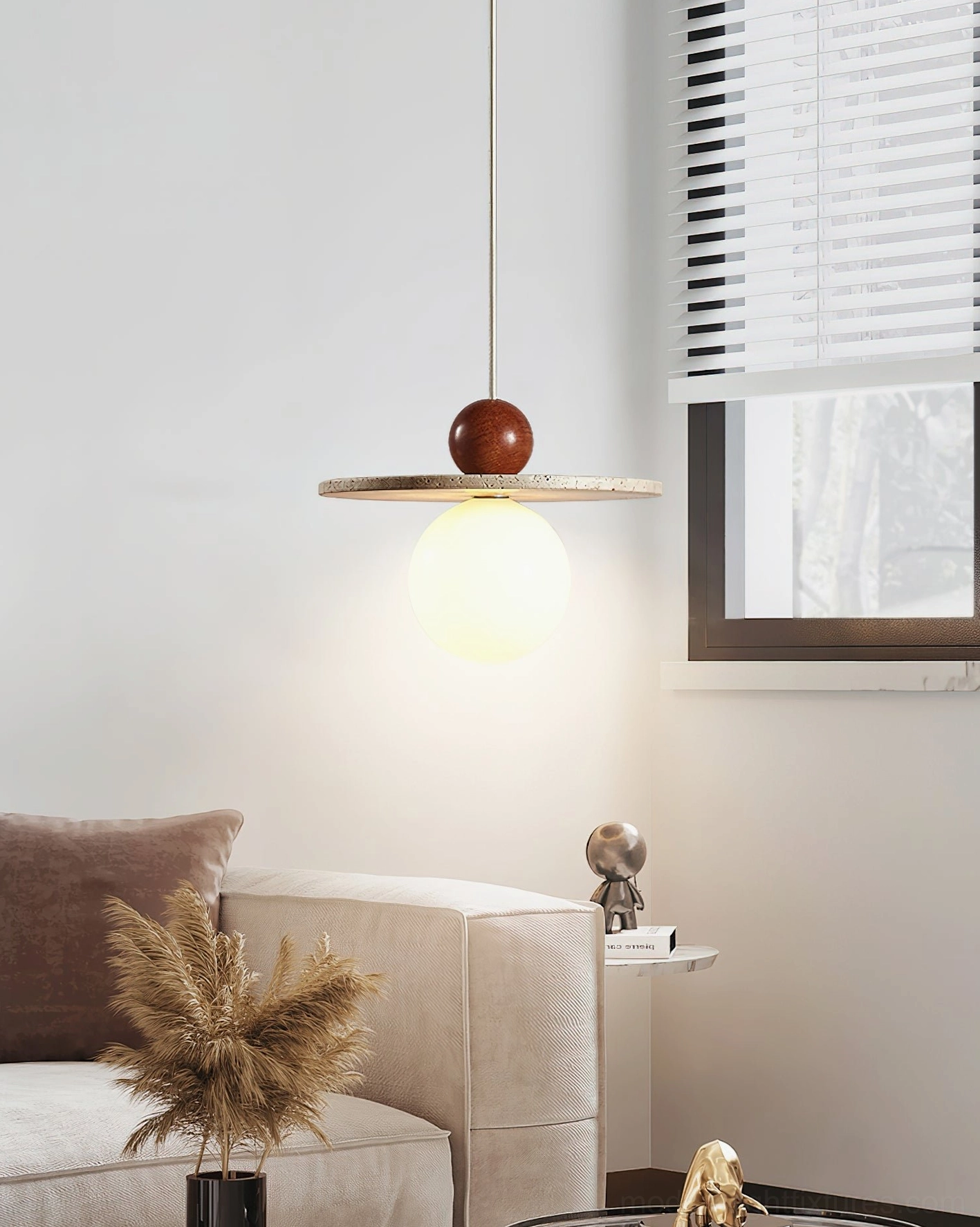 Ora modern pendant light suspended in contemporary living room