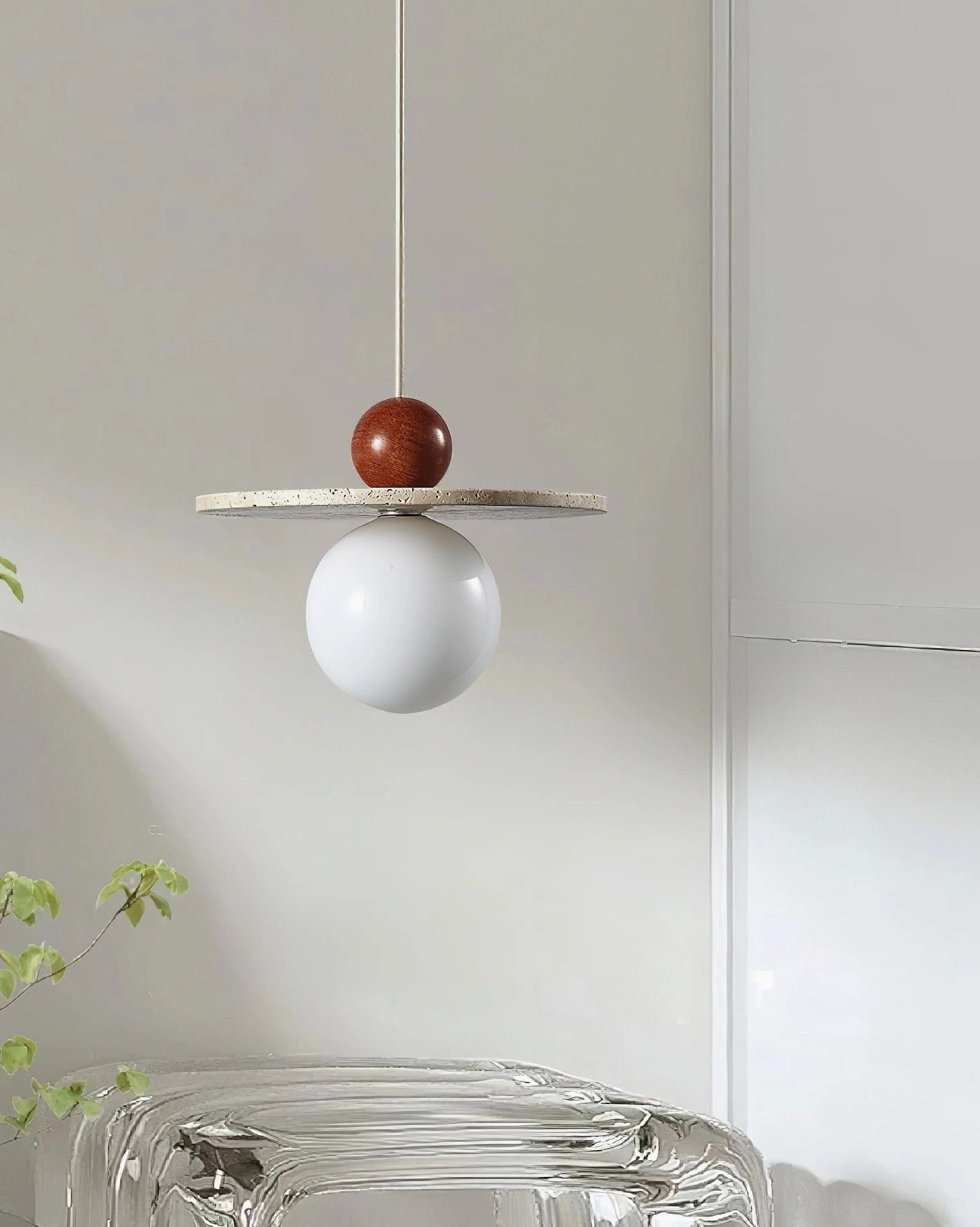 Ora globe pendant light in minimalist interior design setting