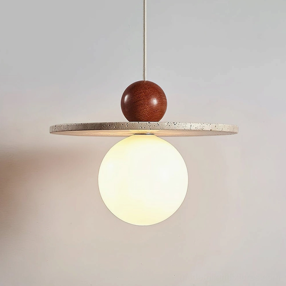 Ora globe pendant fixture showing textured travertine disc and frosted glass diffuser close-up