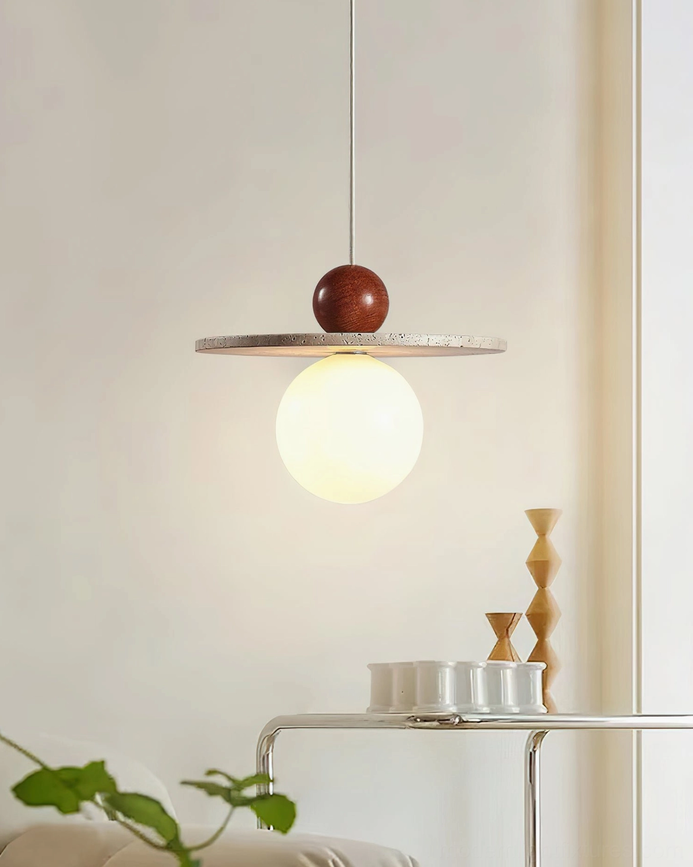 Ora globe pendant with travertine disc in contemporary home decor