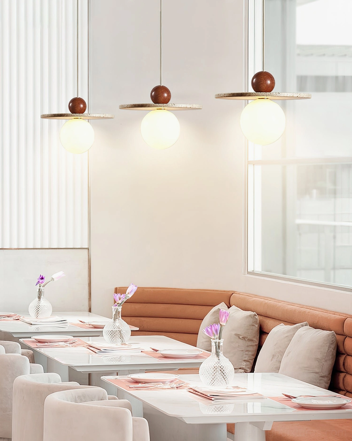 Ora pendant fixture showing natural travertine stone texture and wood element