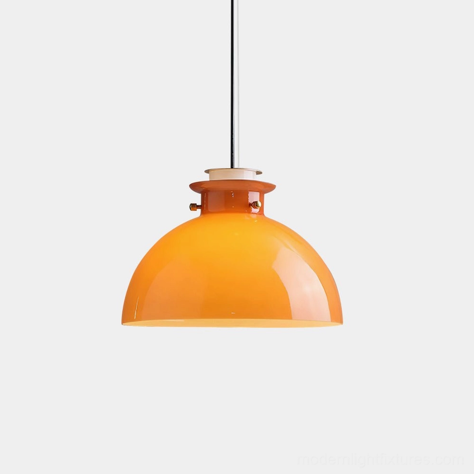 Orange dome pendant light with glossy glass shade and metal hardware, low-angle front view