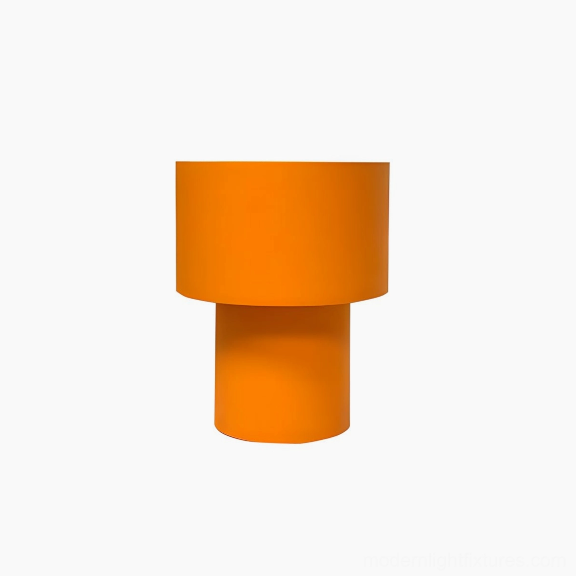 Solid orange cylindrical latticefield table lamp minimalist design matte fabric finish studio shot
