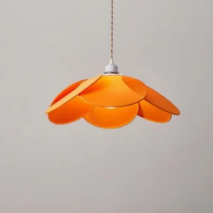 Orange fabric petal pendant lamp with white metal base overhead front view