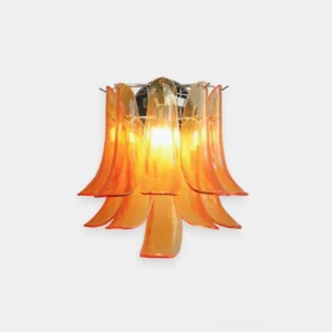 Orange petal glass wall sconce with chrome metal base, frontal studio view showcasing handcrafted glass petal layering