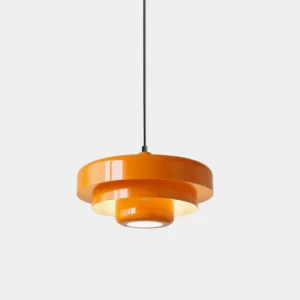 Burnt orange tiered geometric metal pendant light with stacked disc design and glossy finish on white background