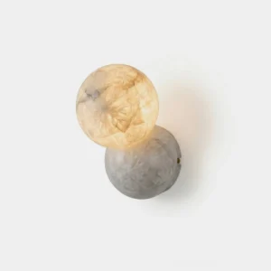 Orb Alabaster Wall Sconce front studio view, double-sphere stacked sculptural alabaster light fixture with warm marbled stone tones