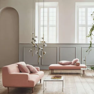 Contemporary orb pendant chandelier installed in luxury modern living room with minimalist furnishings
