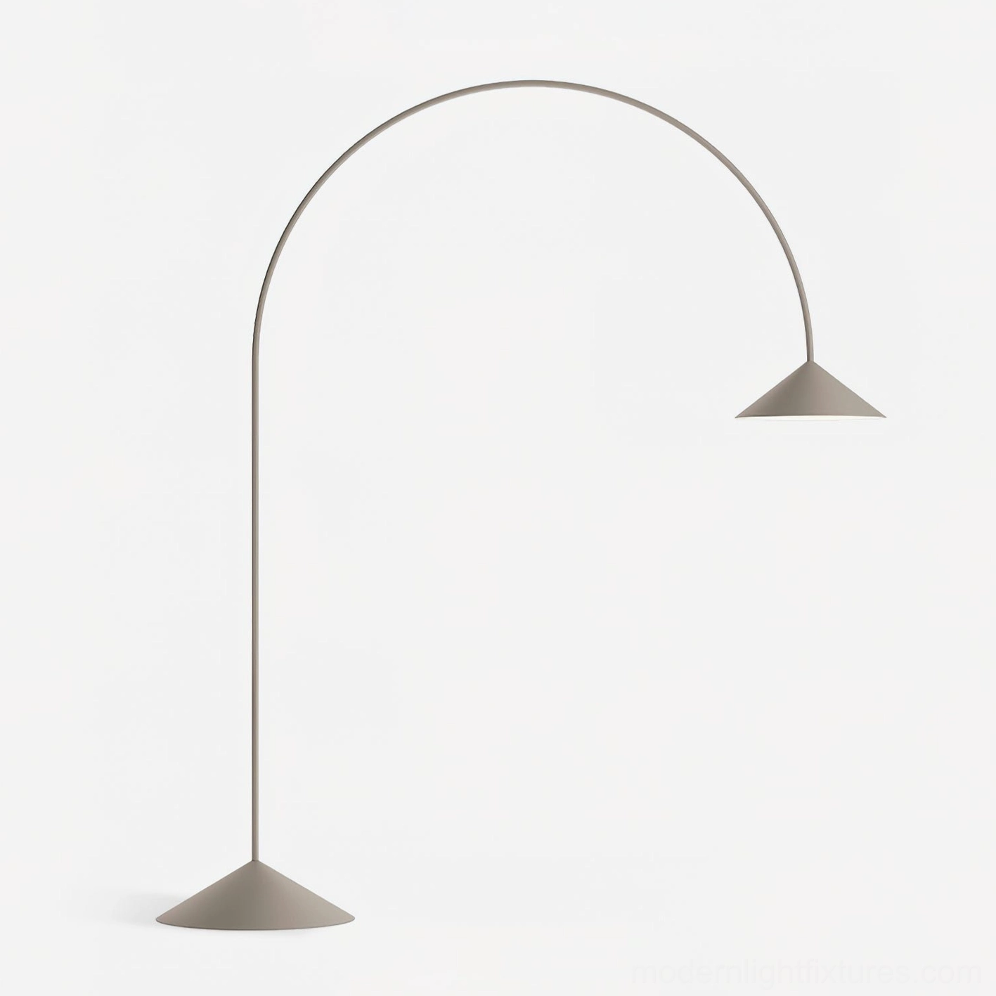 Orbitas arc floor lamp in modern living room providing sophisticated ambient lighting statement piece