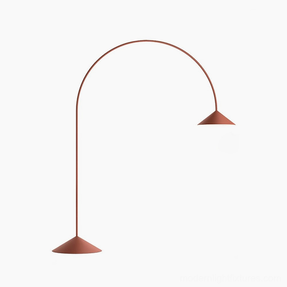 Wine Red Orbitas arc floor lamp with matte finish in contemporary interior design setting