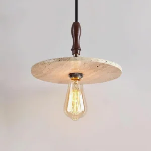 Orbiton stone pendant light three-quarter angle showing exposed warm Edison bulb and wood stem