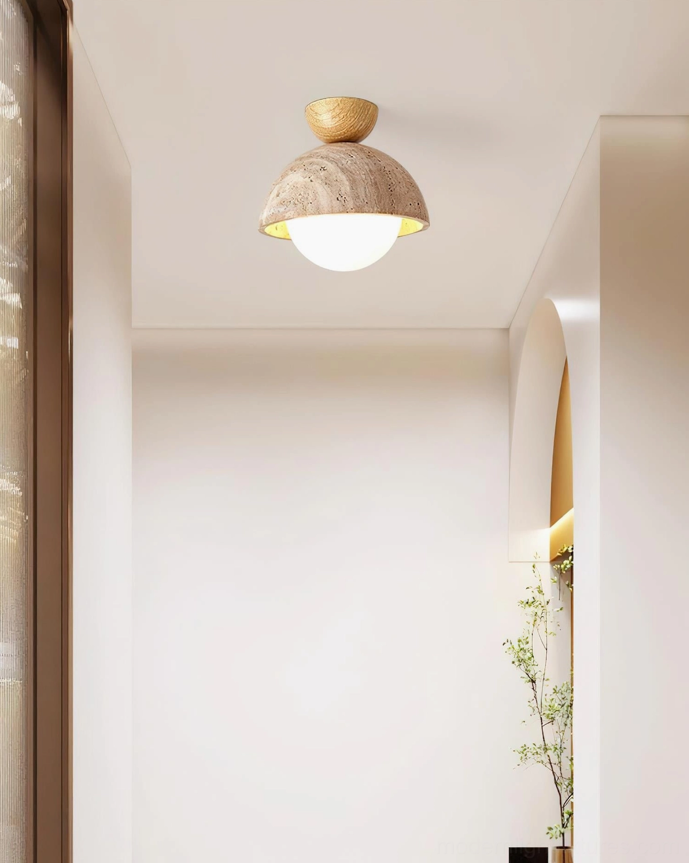 Orella modern ceiling light fixture with walnut wood canopy installed in residential entryway near window and potted plants