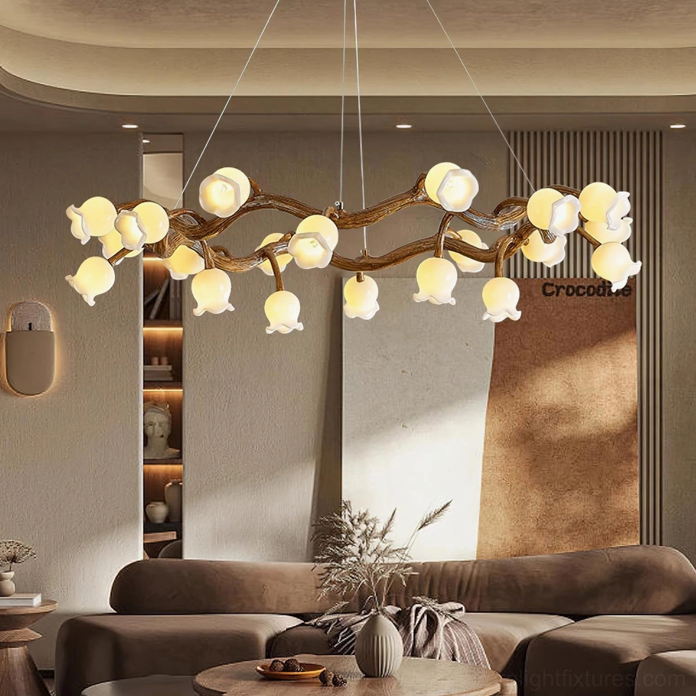 Large organic lily of the valley branch chandelier in luxury living room with brown sofa