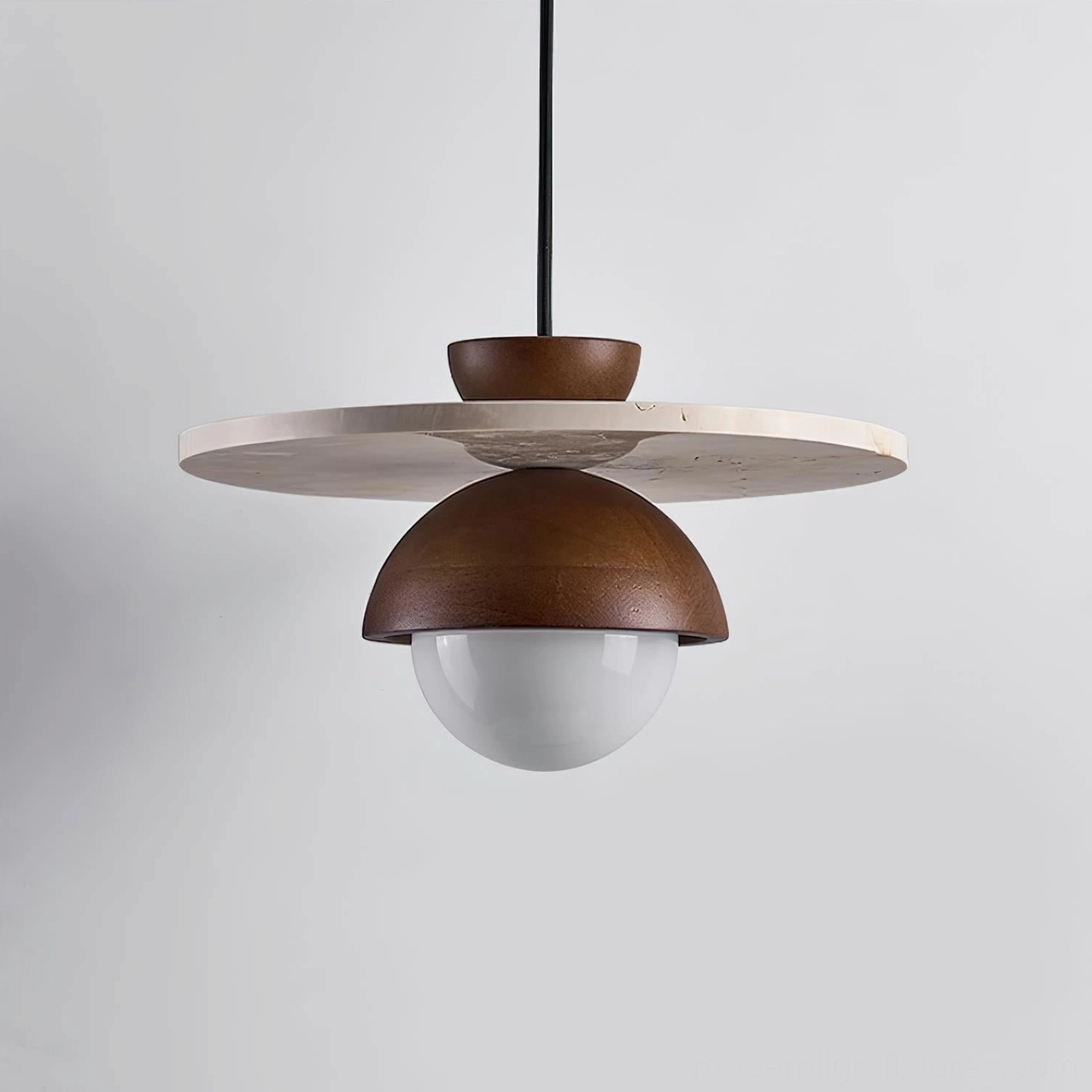 Modern ceiling pendant light with organic travertine texture and refined metalwork