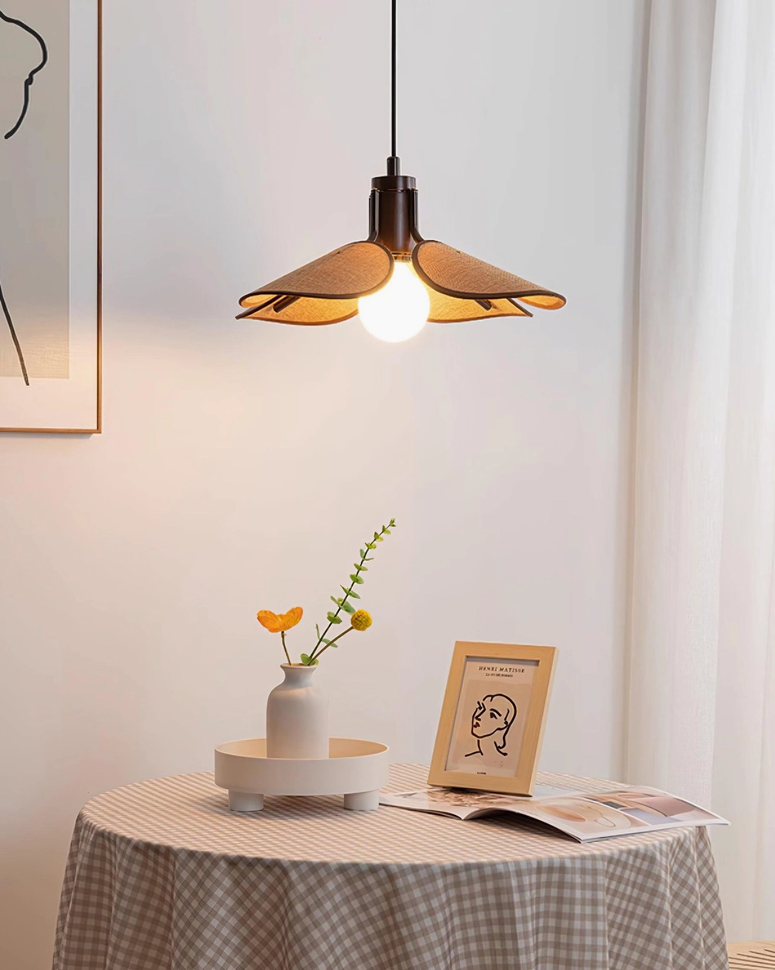 Organic woven rattan pendant featuring sustainable eco-friendly materials and artisanal construction