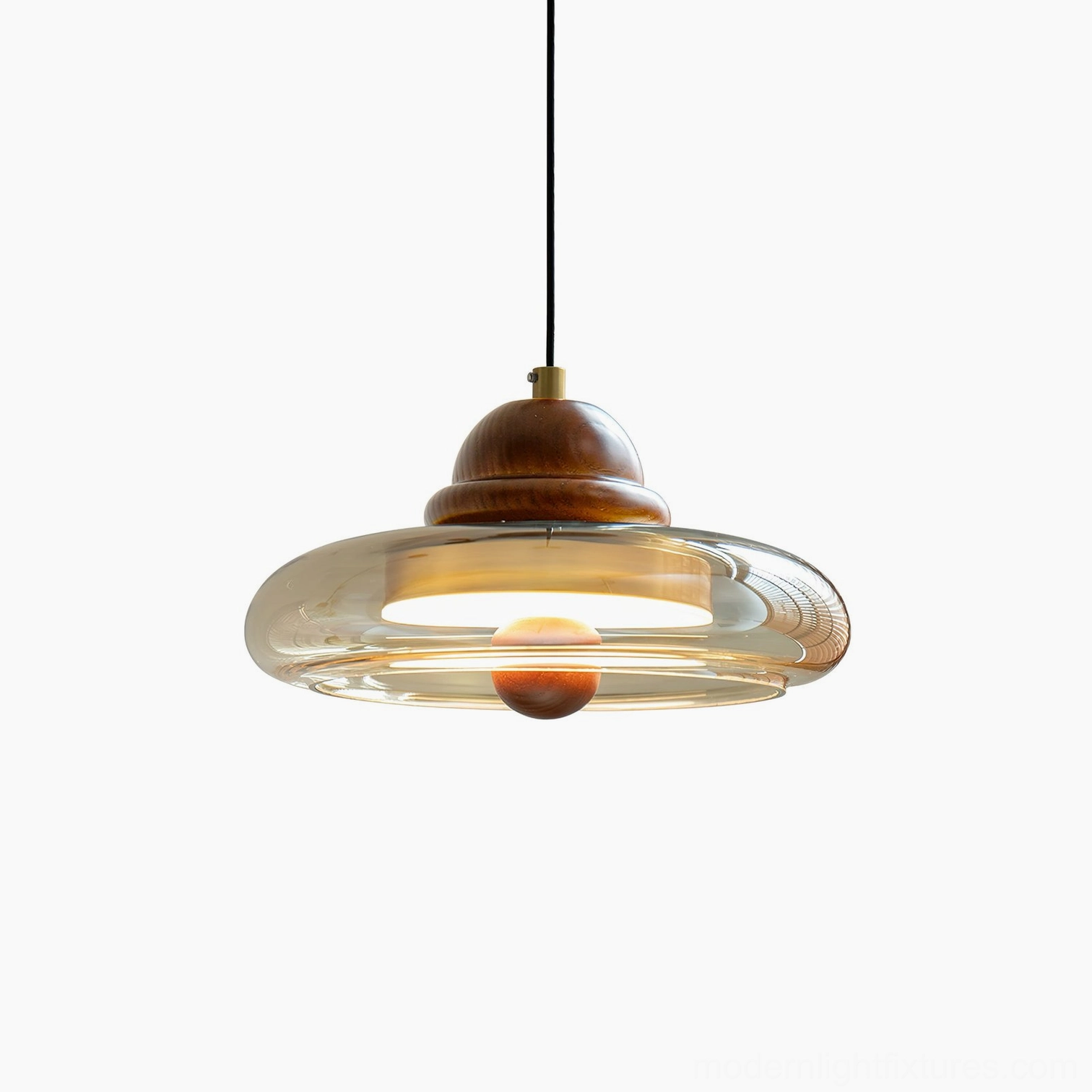 Oria saucer pendant light front view showing mid-century modern design with amber glass and wooden elements