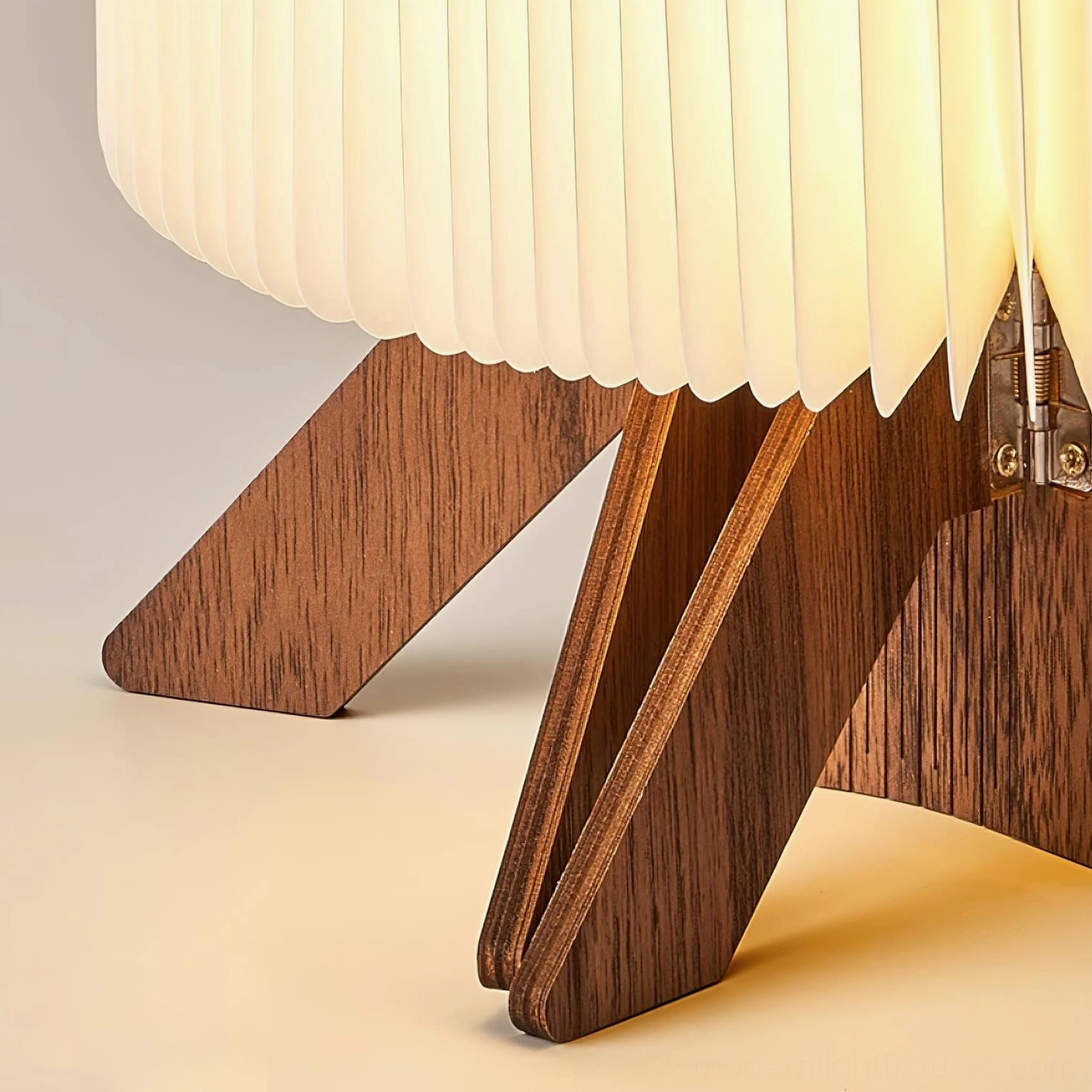 Multiple origami folding lamps creating versatile modern table lamp display in interior design setting