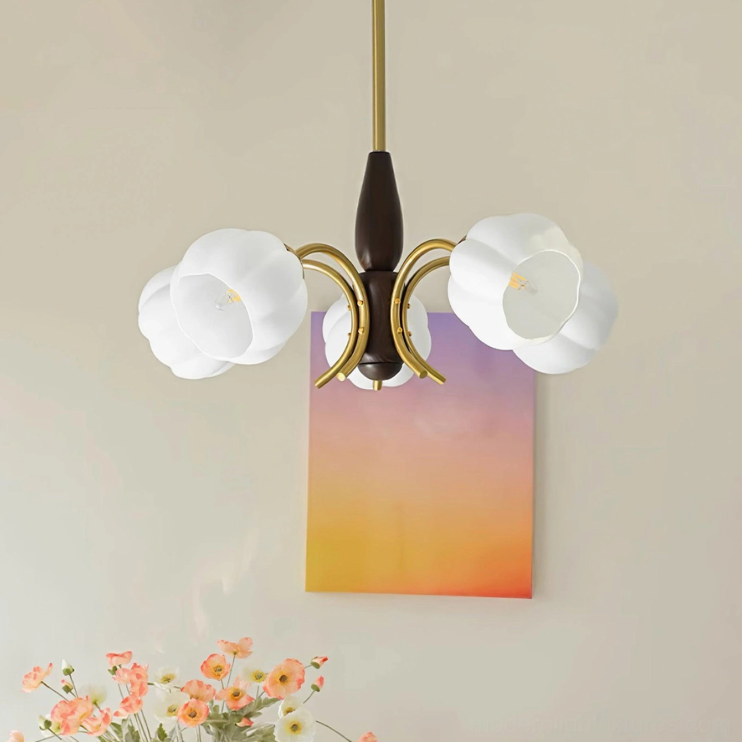 Bottom-up view of Orillia chandelier showing white frosted glass flower petal design and warm glow