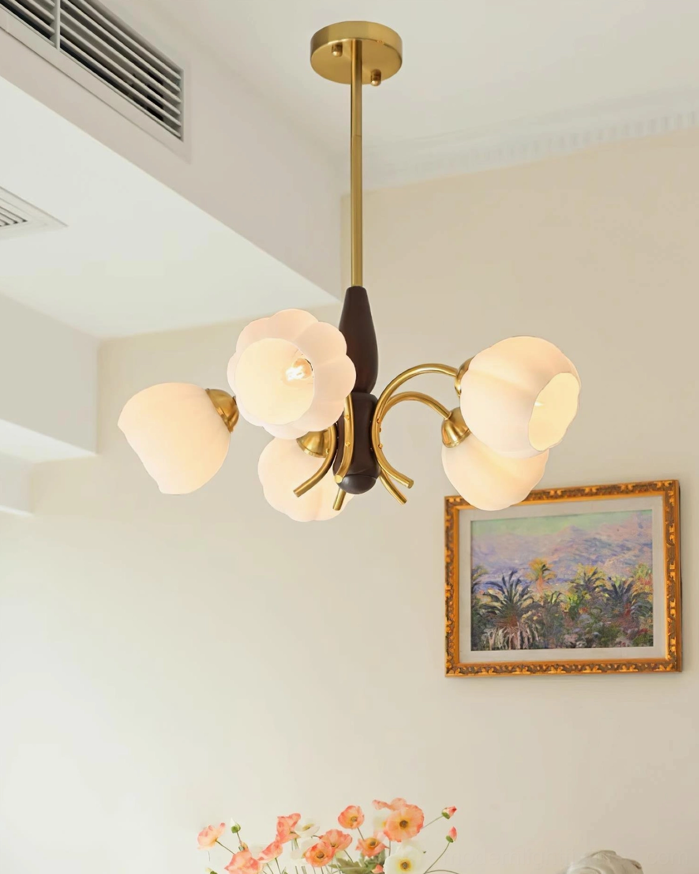 Vintage Orillia frosted flower chandelier with warm brass finish complementing classic interior styling