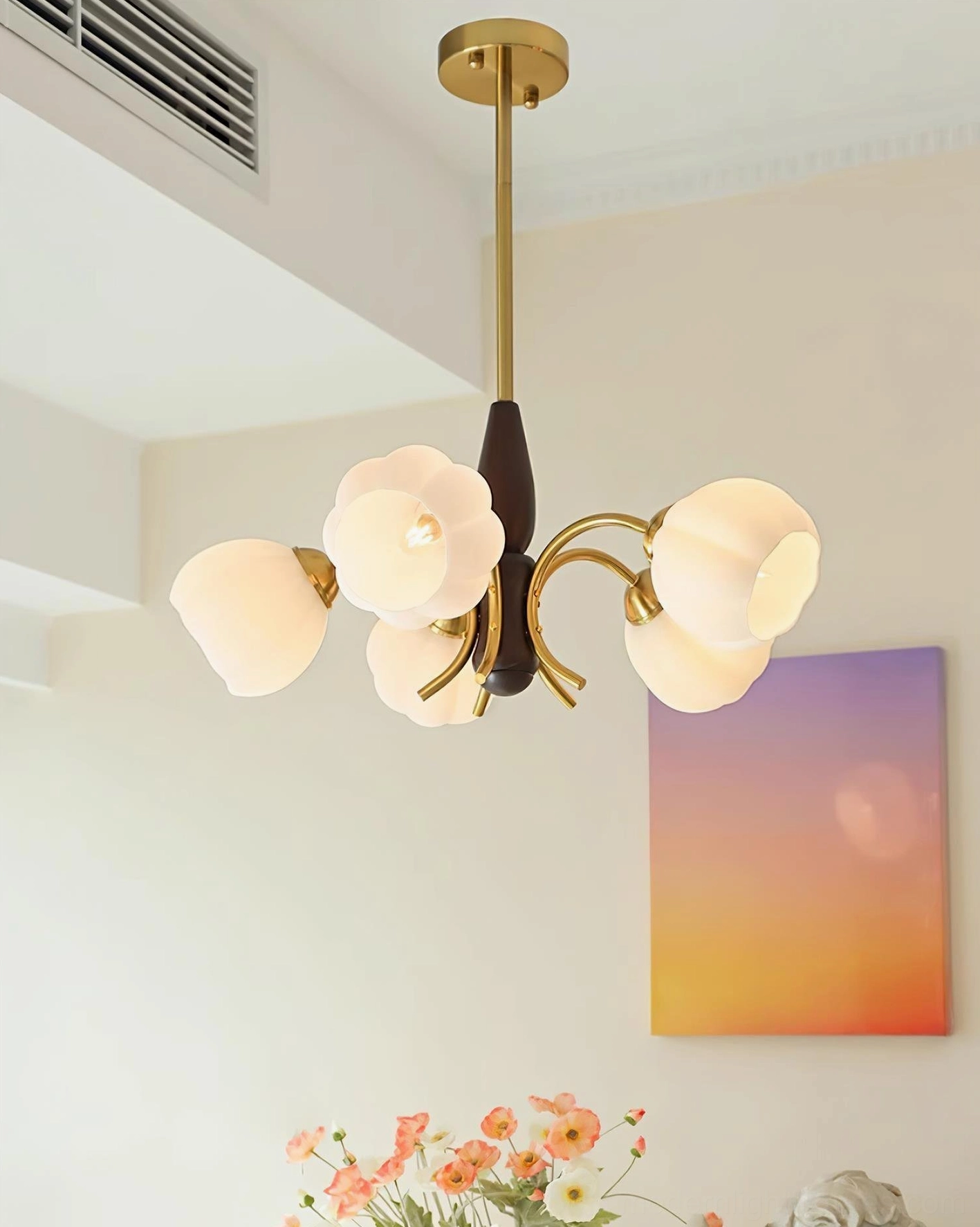 Orillia chandelier in traditional dining room creating focal point above table with soft vintage ambiance
