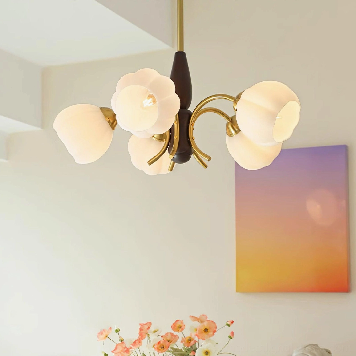 Close-up detail of Orillia frosted glass flower shades with warm ambient glow and cozy home decor backdrop