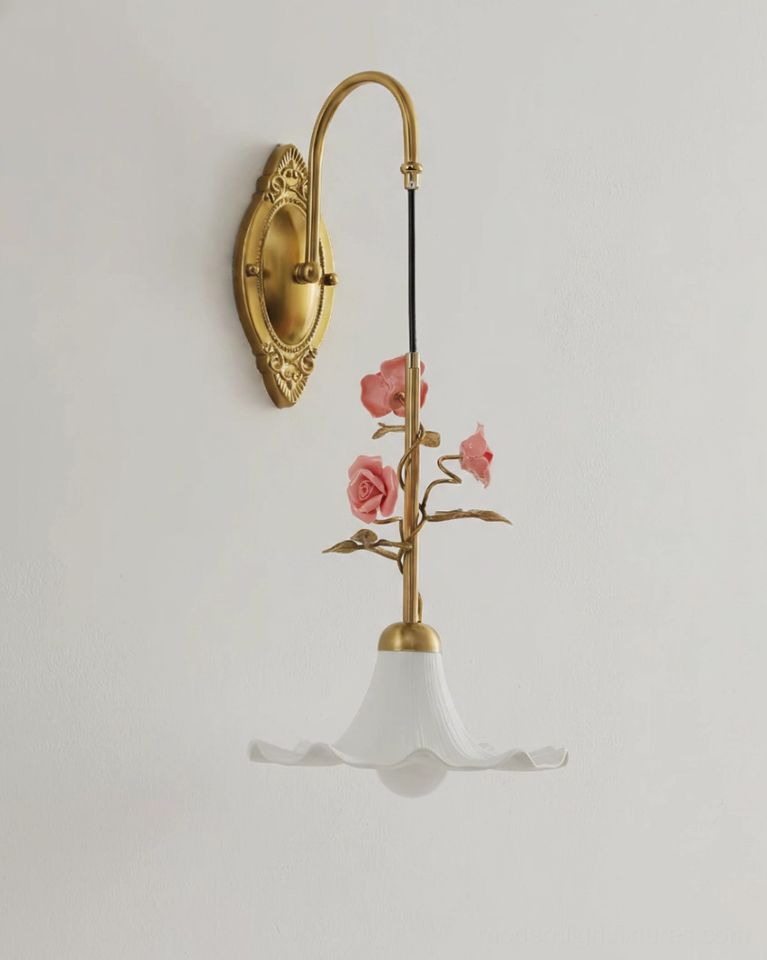 Ornella vine wall sconce with pink rose stem detail and ruffled glass shade, studio product photograph