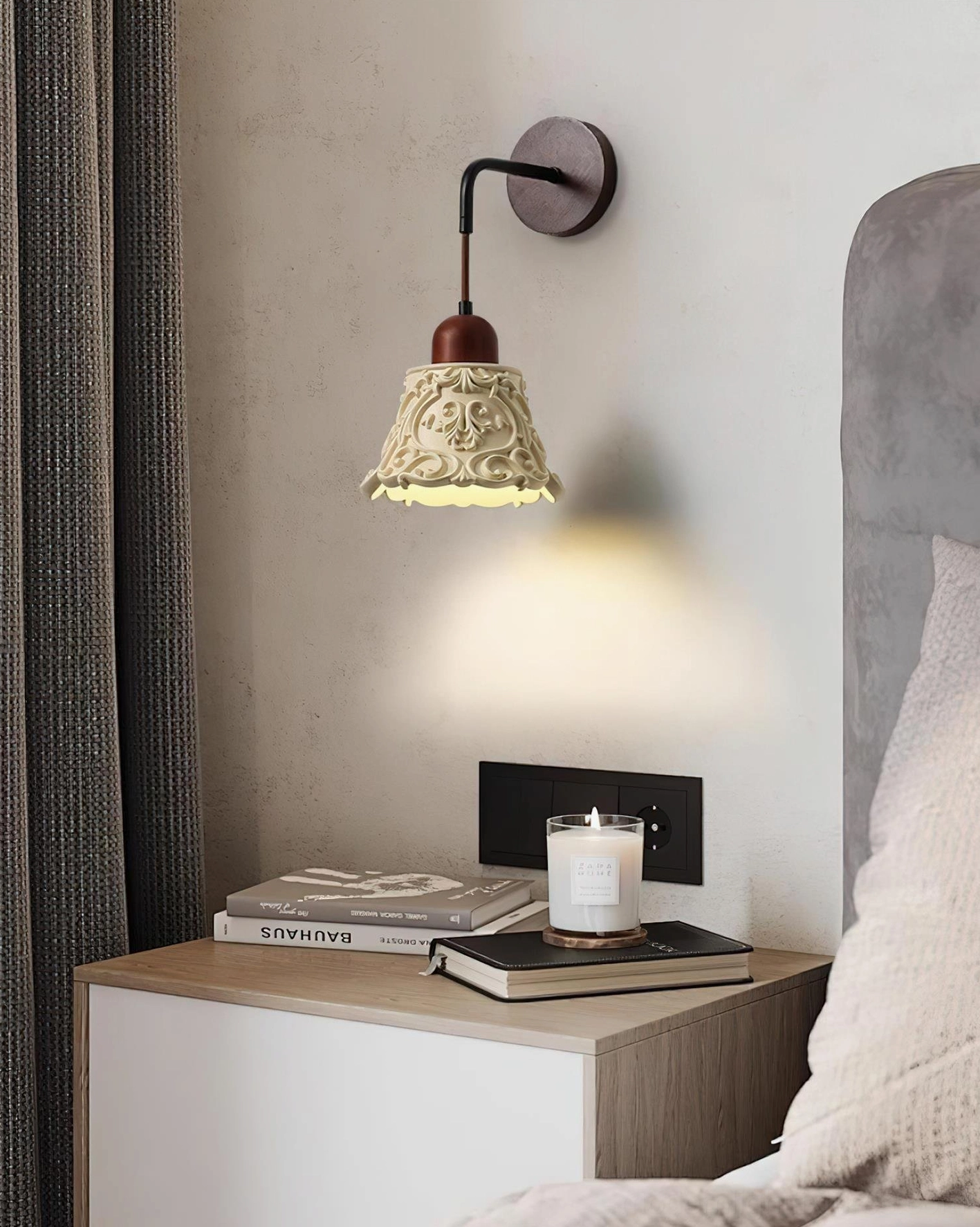 Ornella carved resin wall sconce detail shot showcasing intricate hand-carved floral relief patterns and ivory finish