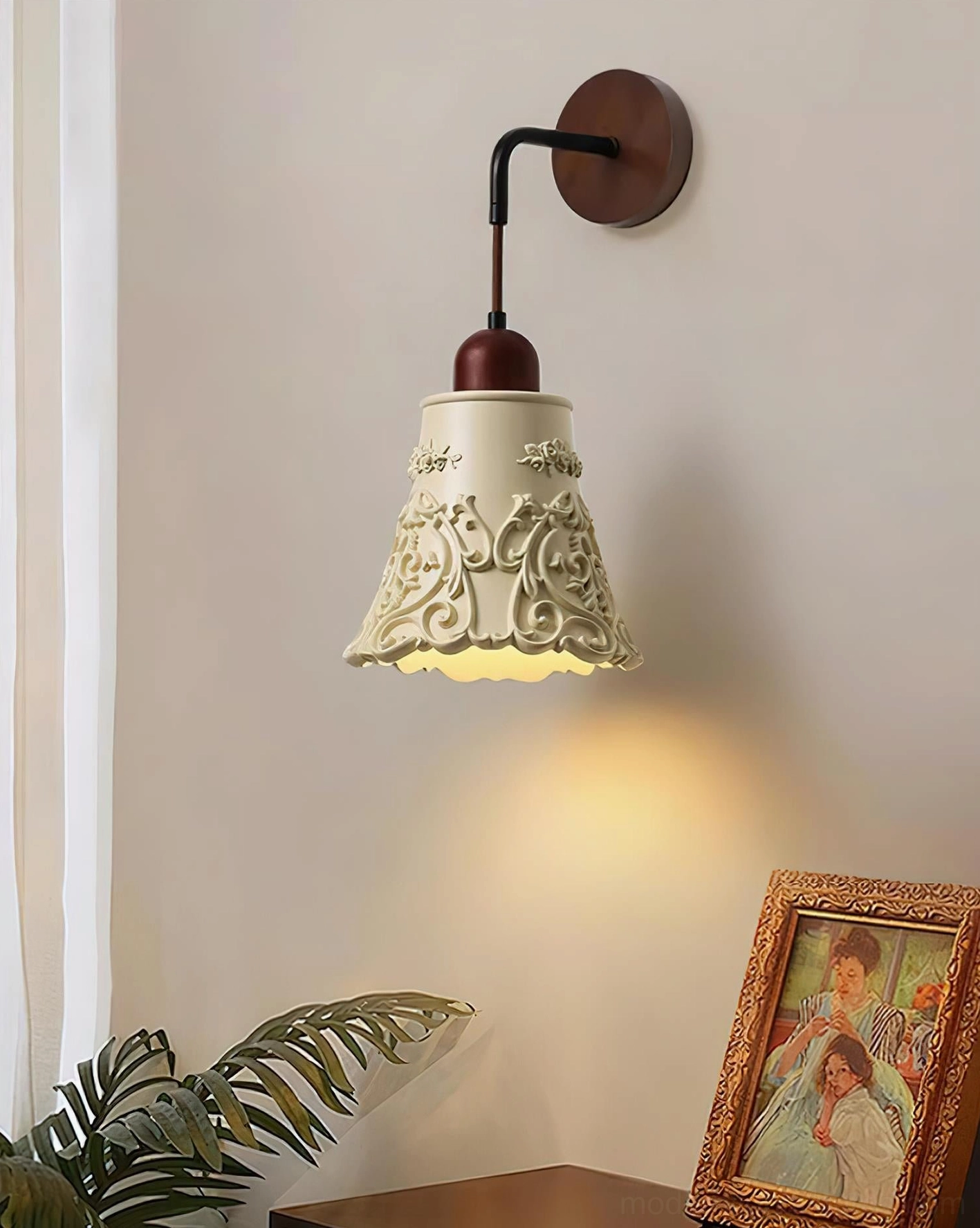 Ornella carved resin wall sconce profile view, showing depth of floral relief carving and wood mounting arm