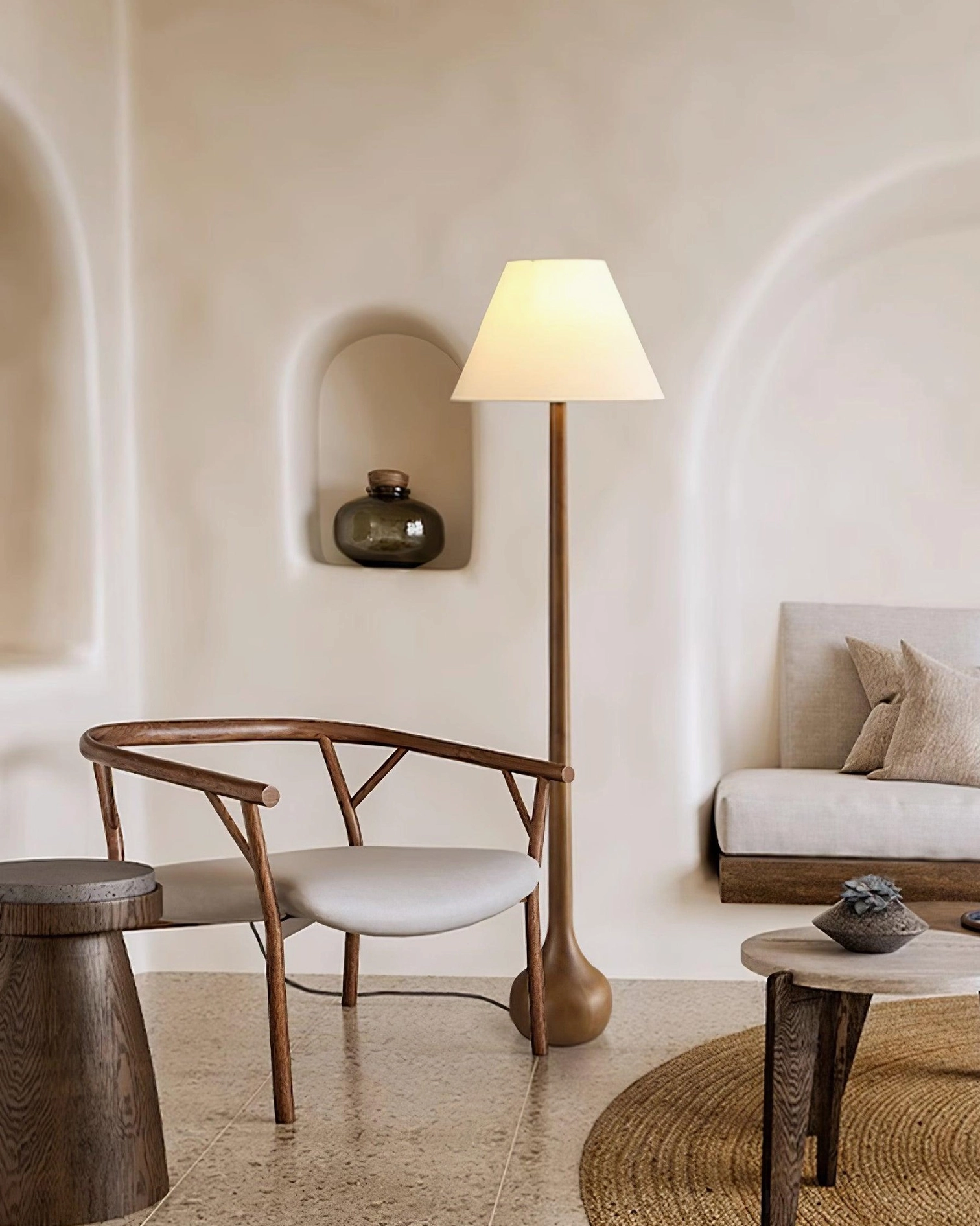 Osaka floor lamp detail shot featuring solid wood pole and spherical base craftsmanship