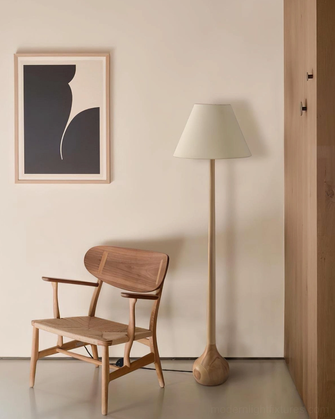 Osaka handcrafted floor lamp in reading nook with wooden armchair and neutral warm interior design