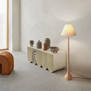 Osaka wood floor lamp in living room interior design setting with minimalist console table and warm ambient lighting