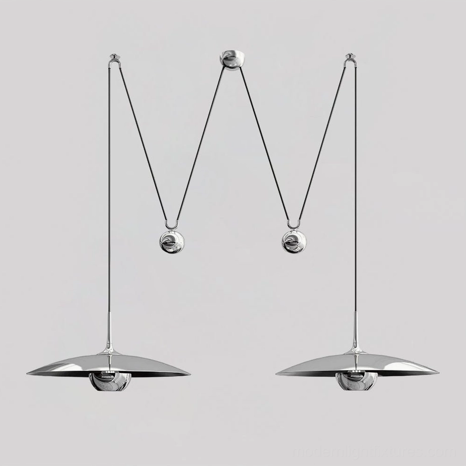 Double Oscar pendant lights chrome finish pair showing symmetric arrangement for coordinated lighting design