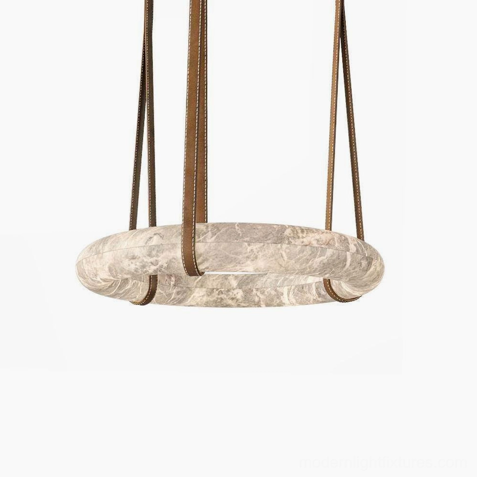 Oslo pendant light installation over kitchen island with dark brown leather strap and warm light ambiance
