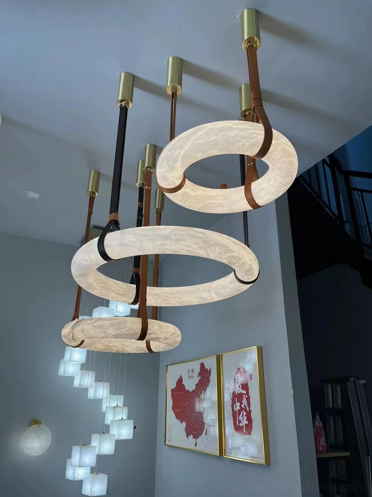 Oslo pendant light installed in minimalist interior design scheme showing sculptural elegance and diffused illumination