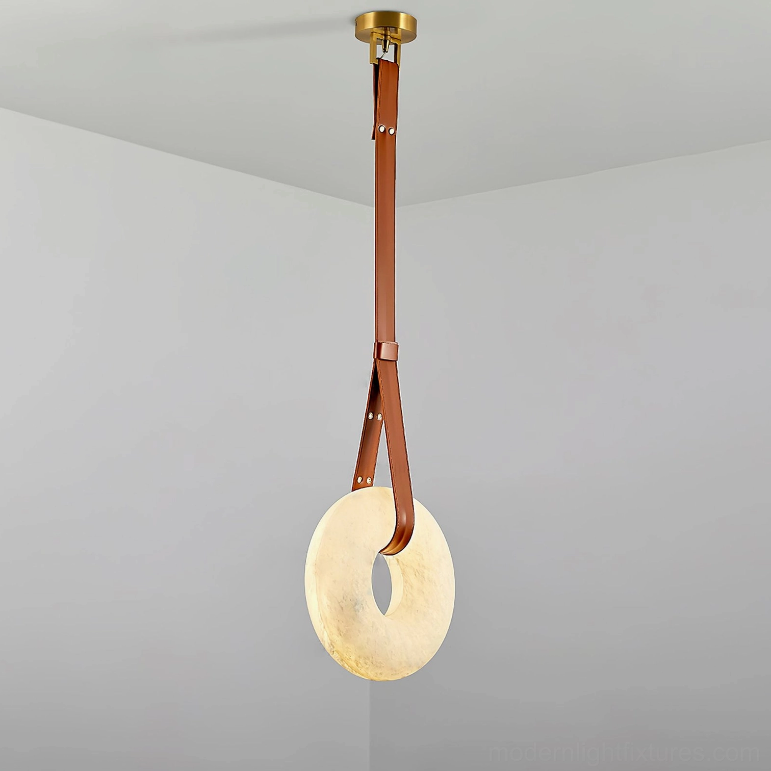 Oslo pendant light in warm white 3000K color temperature creating intimate dining ambiance with soft stone glow
