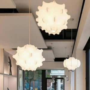 Multiple Otello pendant lights installed in commercial showroom - contemporary lighting display