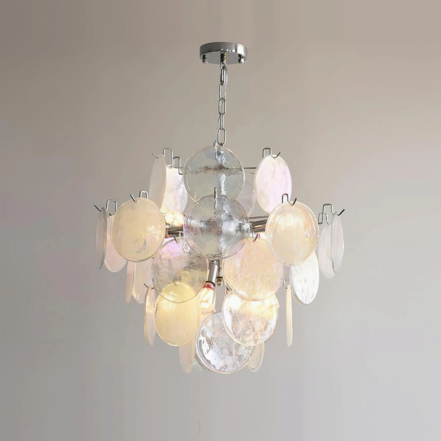 Overhead view of modern glass disc chandelier mounted to ceiling showing disc arrangement pattern