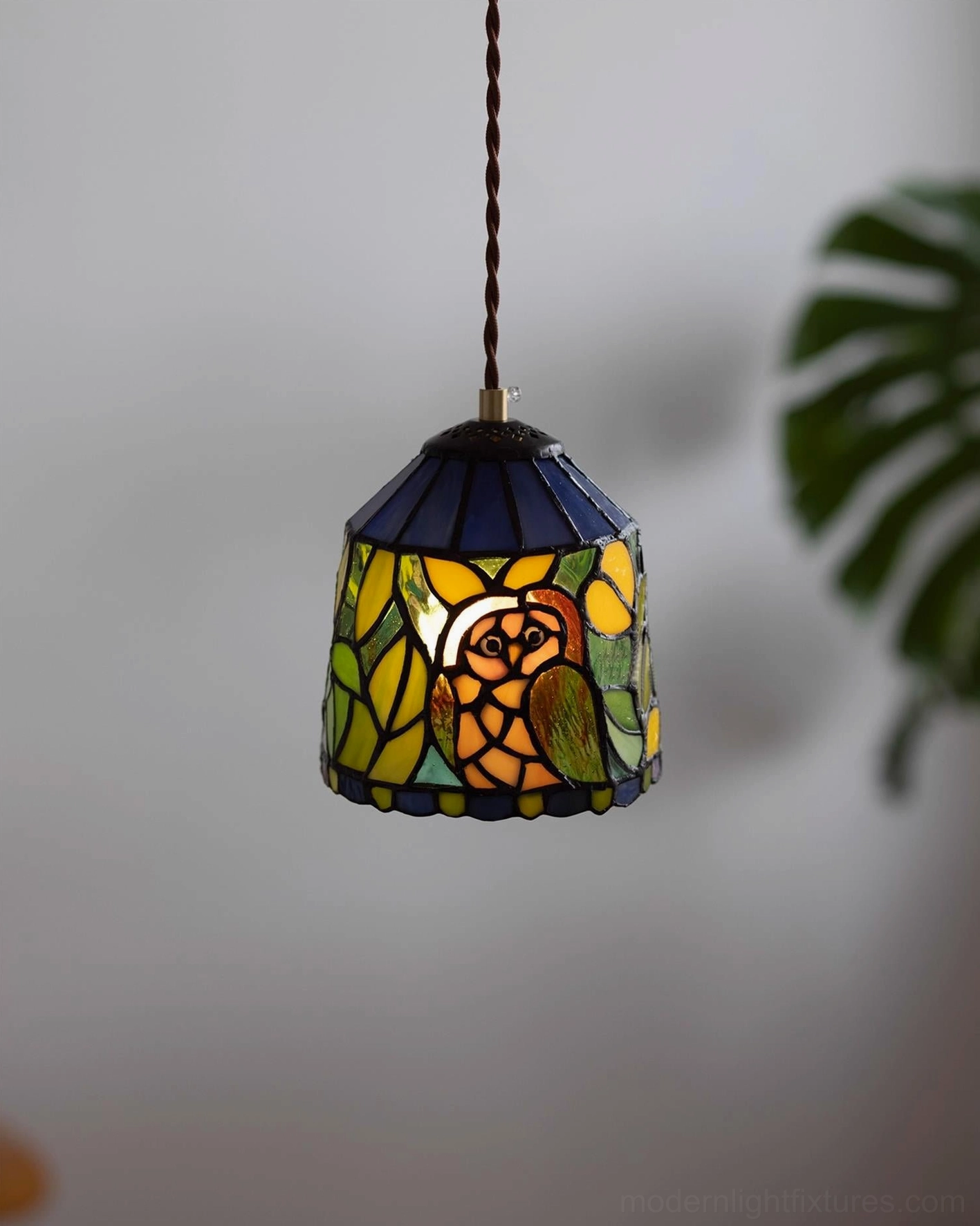 Owl themed handcrafted pendant lamp with navy blue yellow brown stained glass in vintage Tiffany style