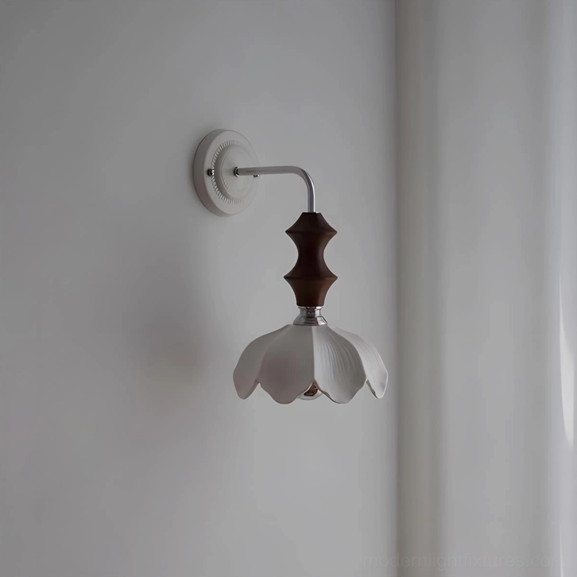 Ceramic wall sconce paired symmetrically in modern farmhouse bedroom with soft ambient lighting design